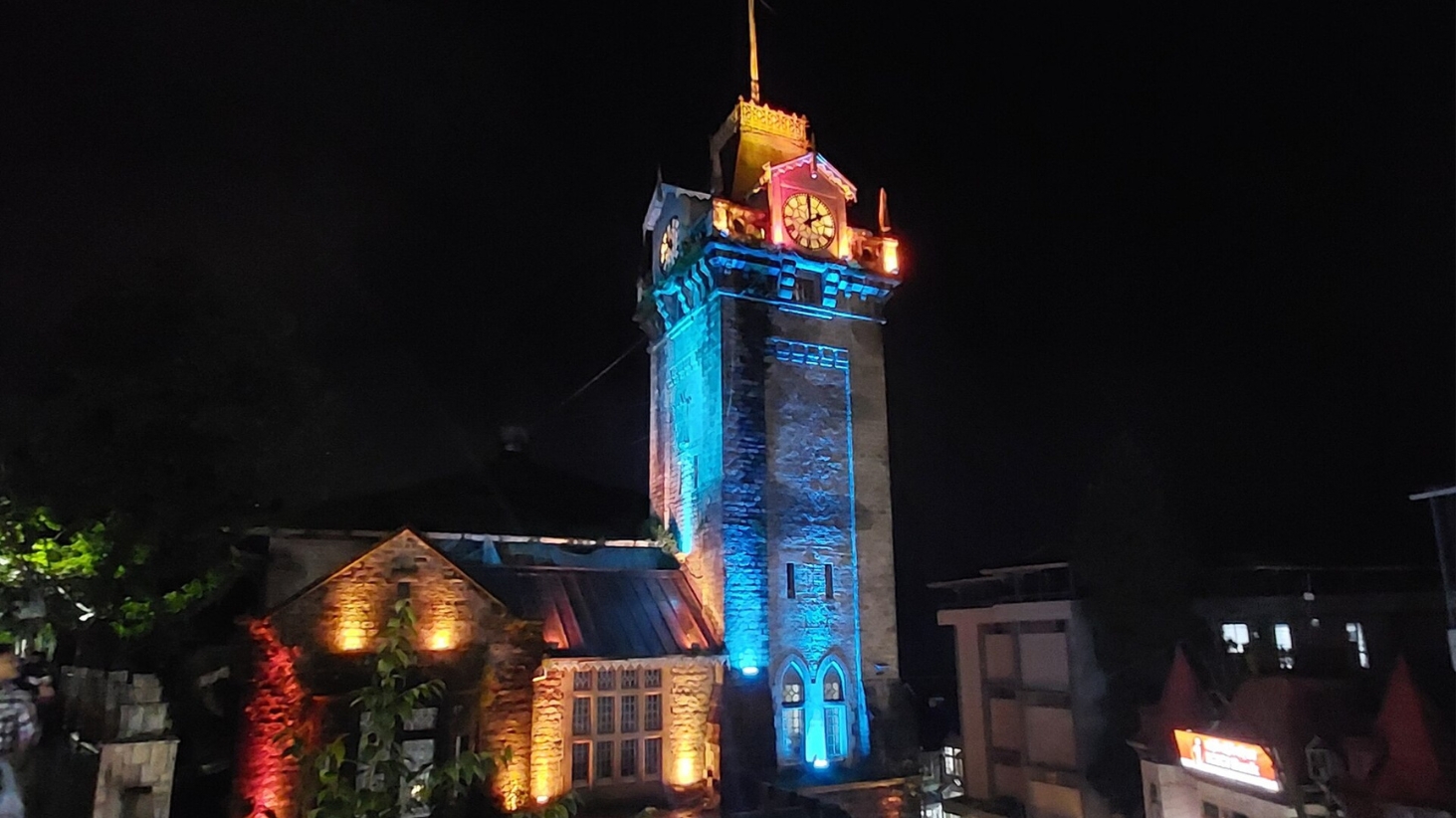 <p>The Clock Tower, illuminated are night. (Picture by Pinakpani, Wikimedia Commons)</p>
