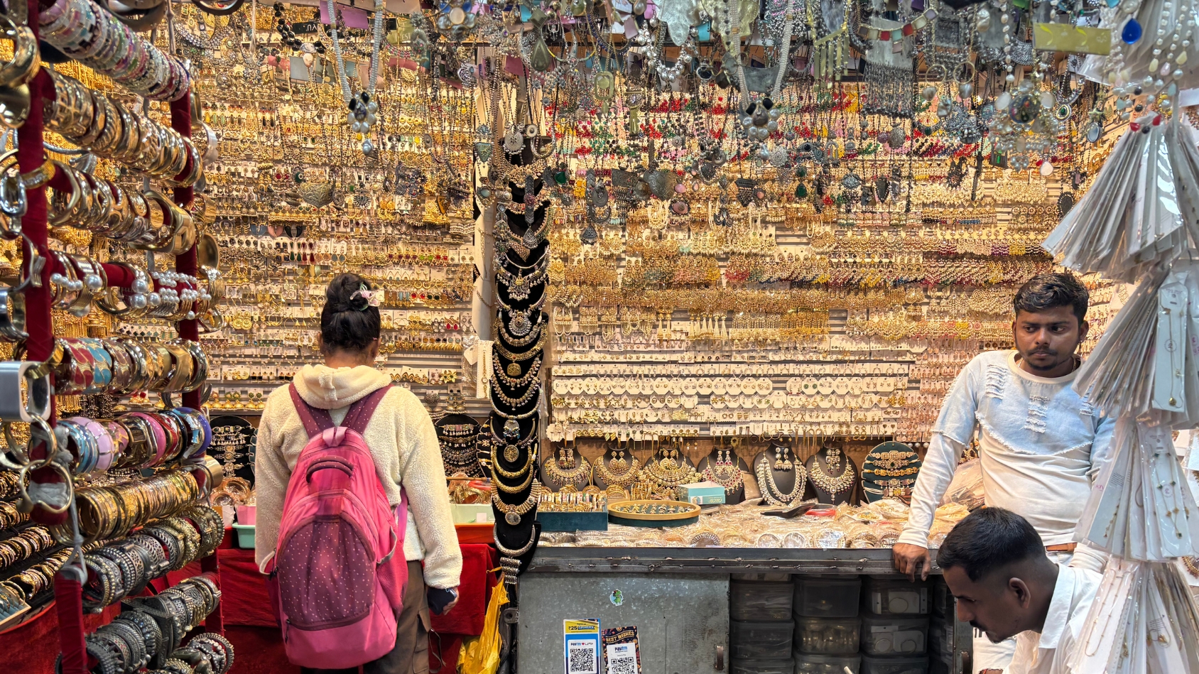 <p>A dazzling wall of gold-toned earrings and necklaces.</p>