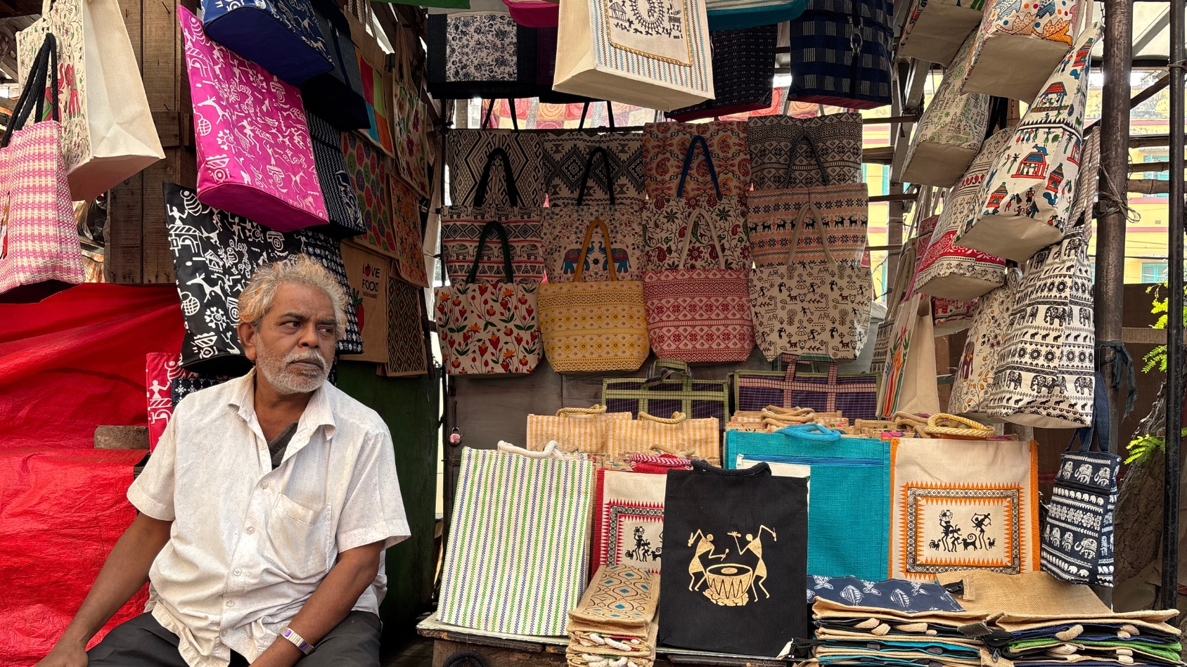 <p>Jute and canvas bags featuring ethnic prints.</p>